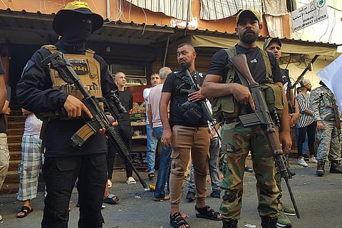 Israeli drone strike in Lebanon: Palestinian Fatah fighters from Al-Aqsa Martyrs' Brigades during the funeral procession of Khalil al-Maqdah